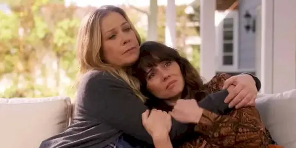 Christina Applegate as Jen and Linda Cardellini as Judy hugging in season 3 of Netflix