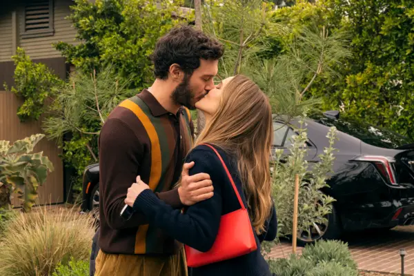 Adam Brody as Noah and Kristen Bell as Joanne in Nobody Wants This season 2, kissing.